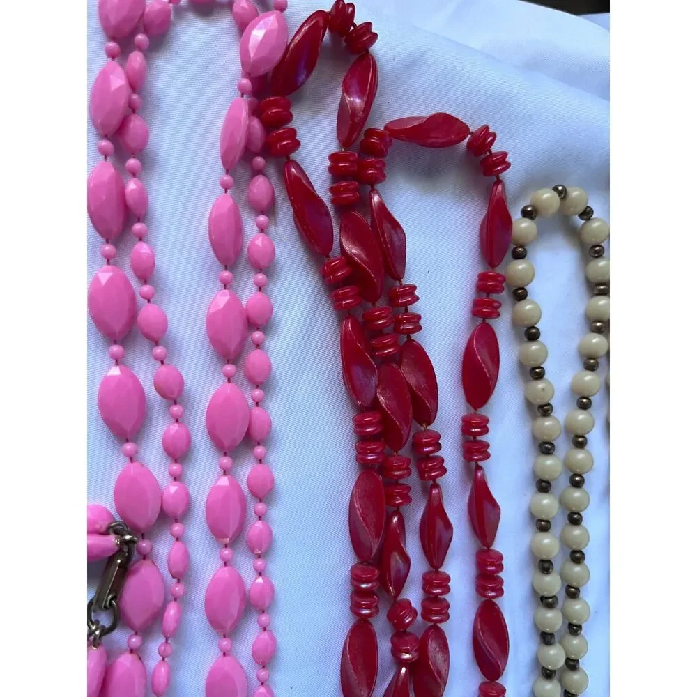 Lot of 4 plastic 1970's Vintage Long Necklaces